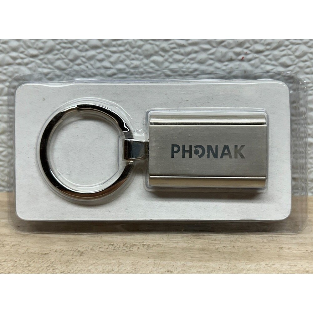2007 josTTech GmbH Phonak Hearing Battery Carrier Keychain Made In Switzerland